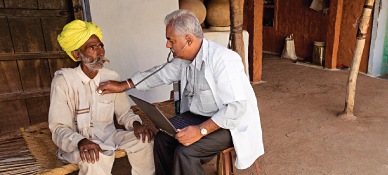 Doctor examining an African man