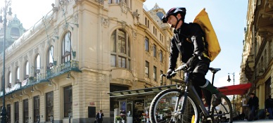 Man on a bike with a messenger bag