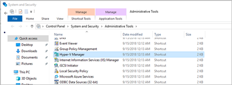 Open Hyper-V Manager by going to Control Panel > System & Security > Administrative Tools
