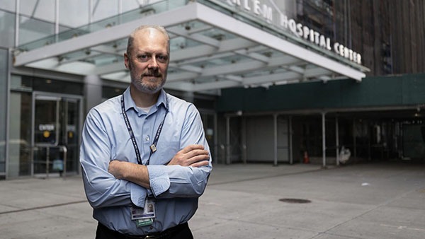 Man in front of hospital