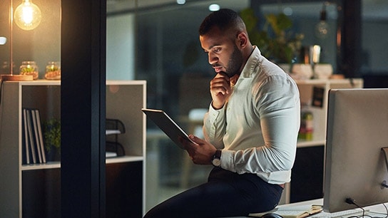 Office worker on handheld device