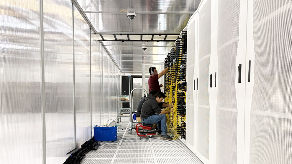 Technicians working in a data center